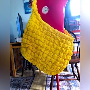 Bright yellow Free people puffer bag. NWOT’s